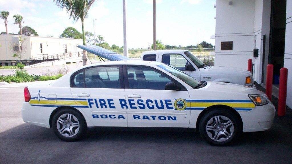 boca raton fire rescue car with yellow and blue line design