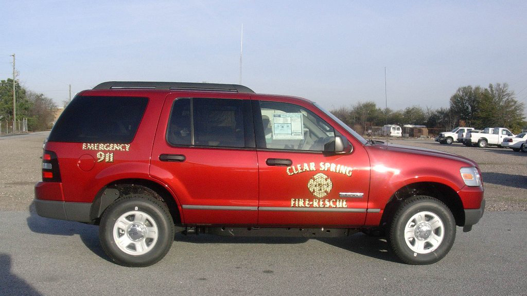 clear spring red fire rescue car with gold design