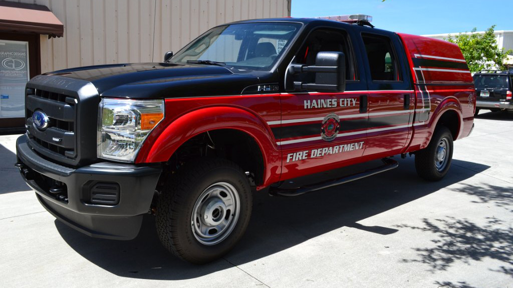 black and red haines fire department car