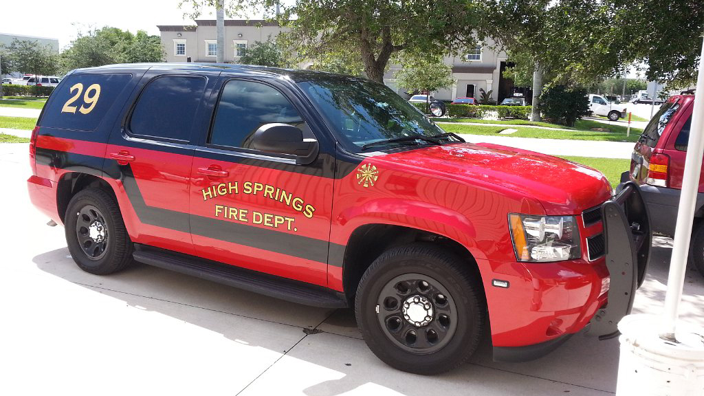 high springs red and black fire department car with logo design