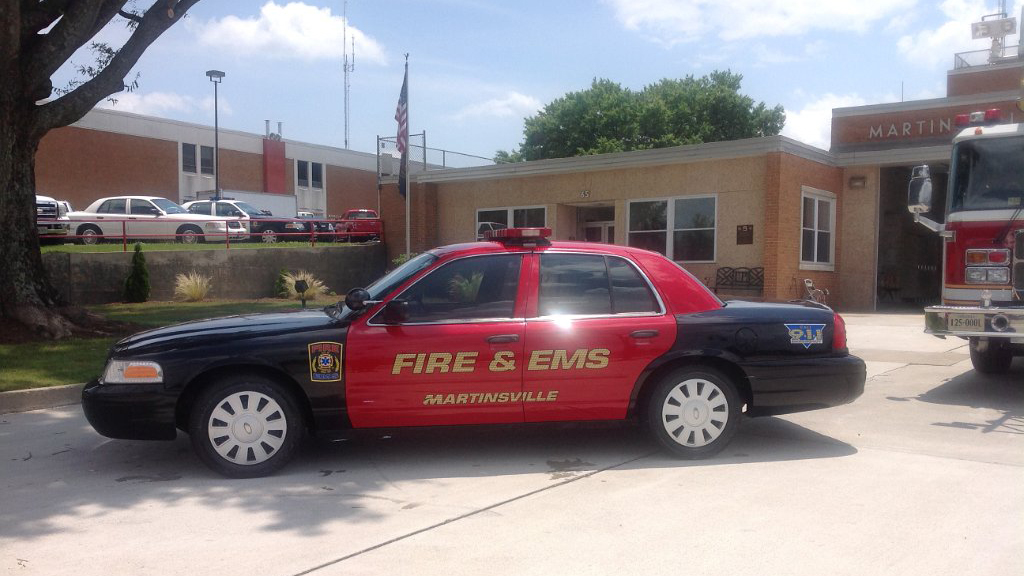 red and black graphic design of martinsville fire and ems rescue car