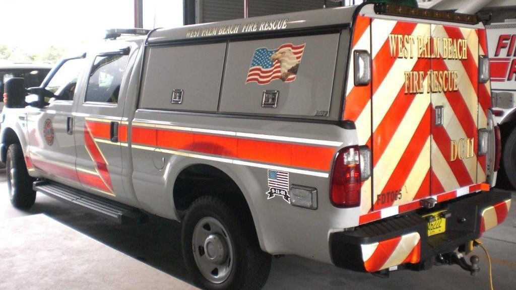 west palm beach fire rescue truck with orange line design