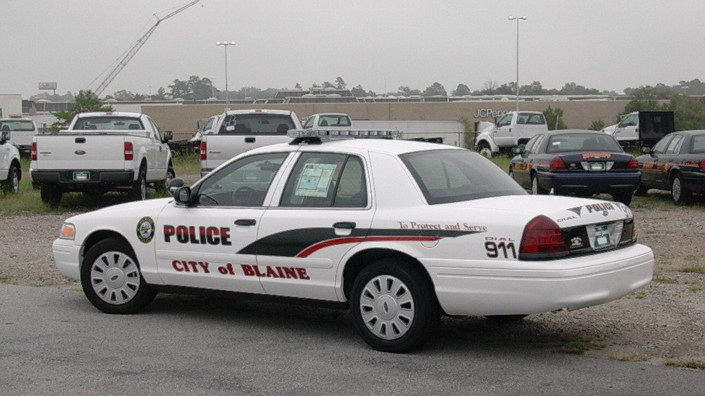 blaine white police car graphic design parked
