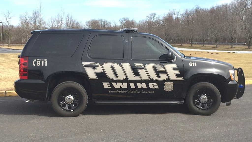 plain black ewing police car with logo design