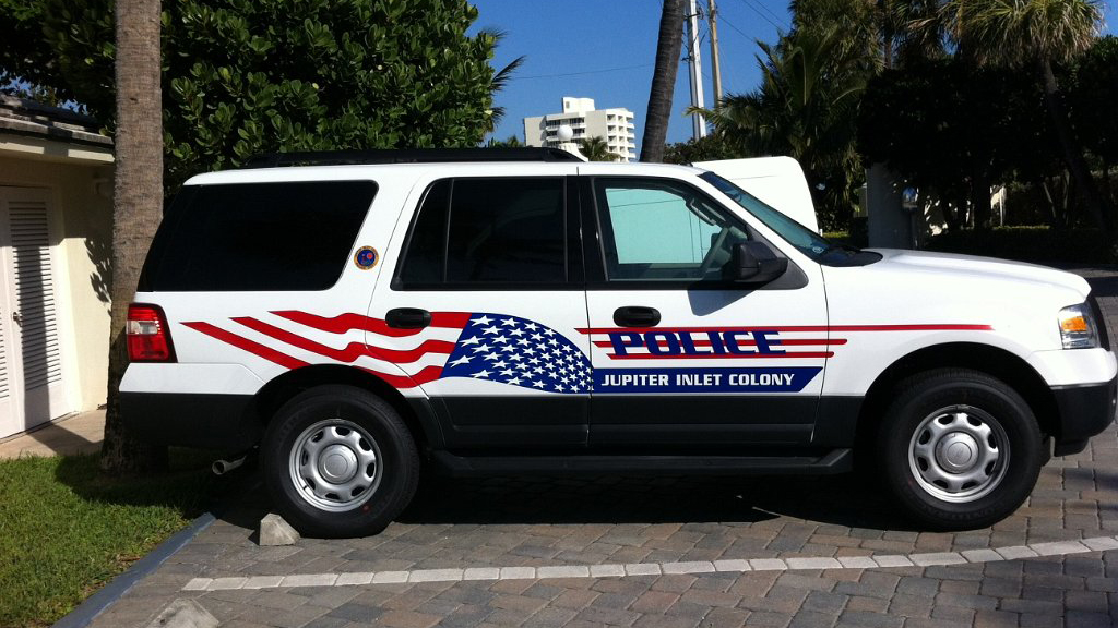 graphic design of jupiter inlet police car