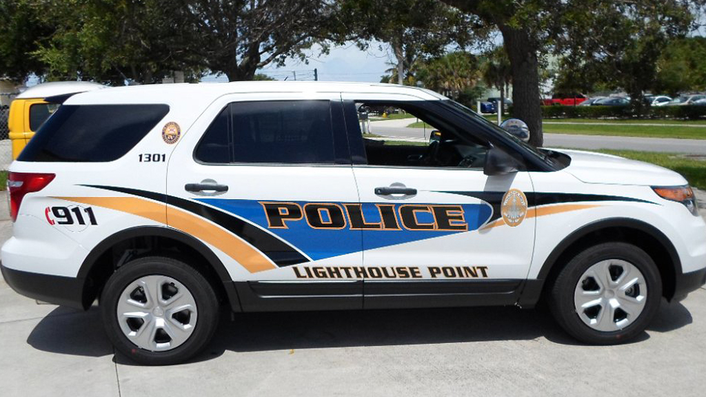 graphic design of lighthouse white police car