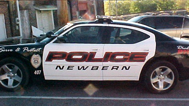 side view design of police newbern car