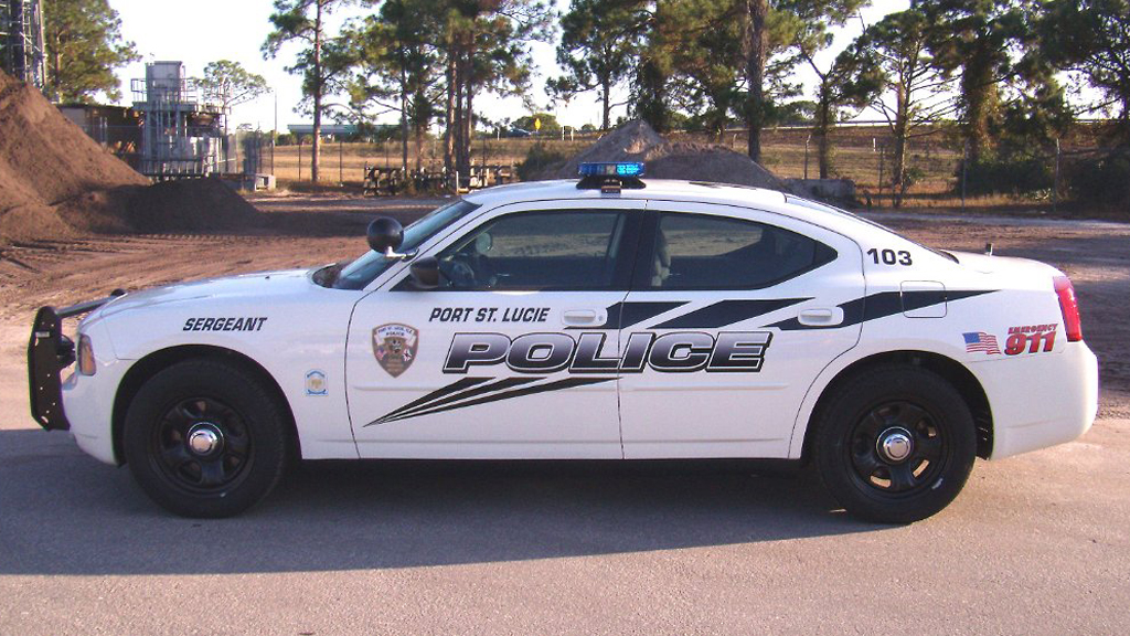 white port police car with logo design